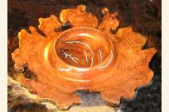 Mesquite natural edge bowl by artist Buddy Compton.